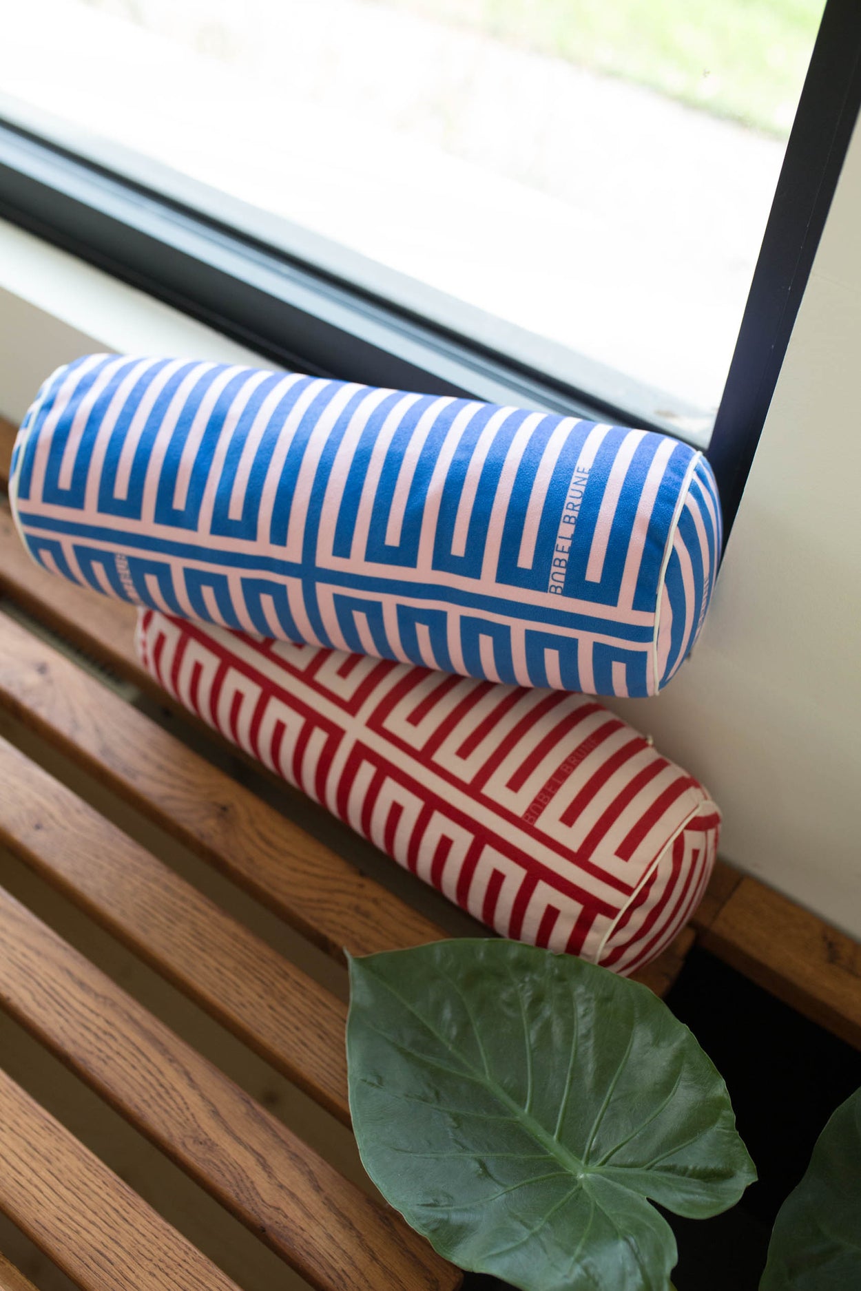 Coussin Bolster Elios rouge & rose